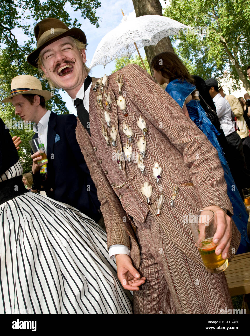 2010 Chap Olympiad : eccentric throw back event with themed entertainment and challenges including umbrella jousting , hurling t Stock Photo