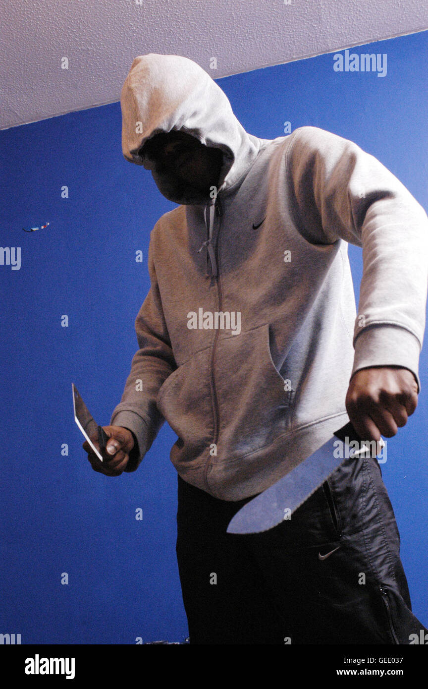 A member of the 'Muslim Boys' gang pictured in a safe house in Peckham, South London. 28.01.05 Stock Photo