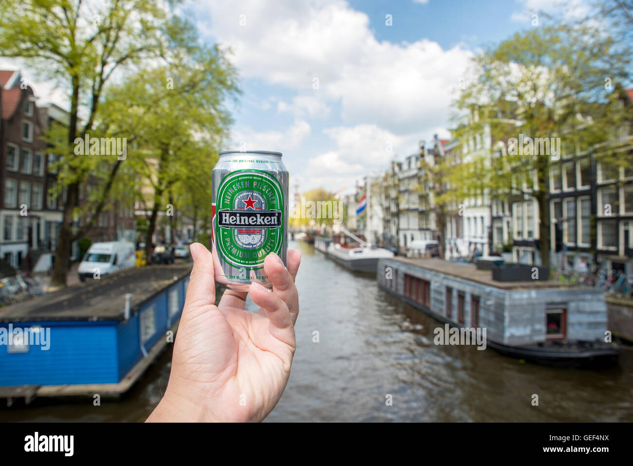 Heineken beer can place on along canal in Amsterdam, Netherlands. Stock Photo