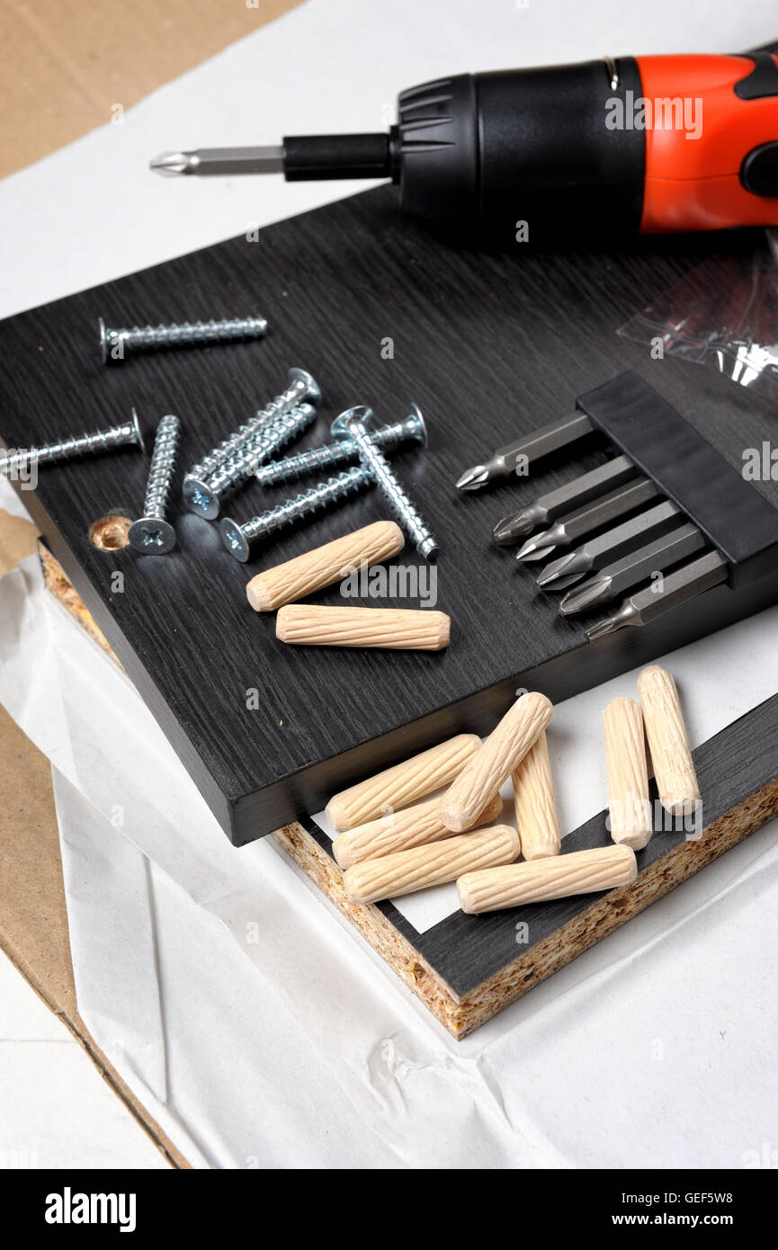 preparing for furniture installation with screws and bolts Stock Photo