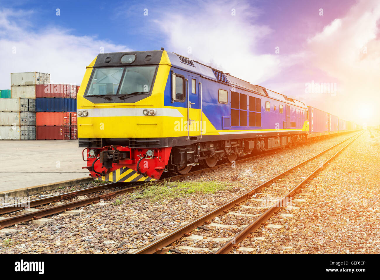 Import, Export, Logistics concept - Cargo train platform with freight train container at depot use for Import, Export, Logistics Stock Photo