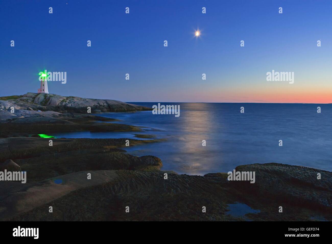 geography / travel, Canada, Nova Scotia, Peggy's Cove, Peggy's Cove Ligthhouse and moon during blue hour, Peggy's Cove, St Margarets Bay, Lighthouse Route, Highway 333, Nova Scotia, Stock Photo