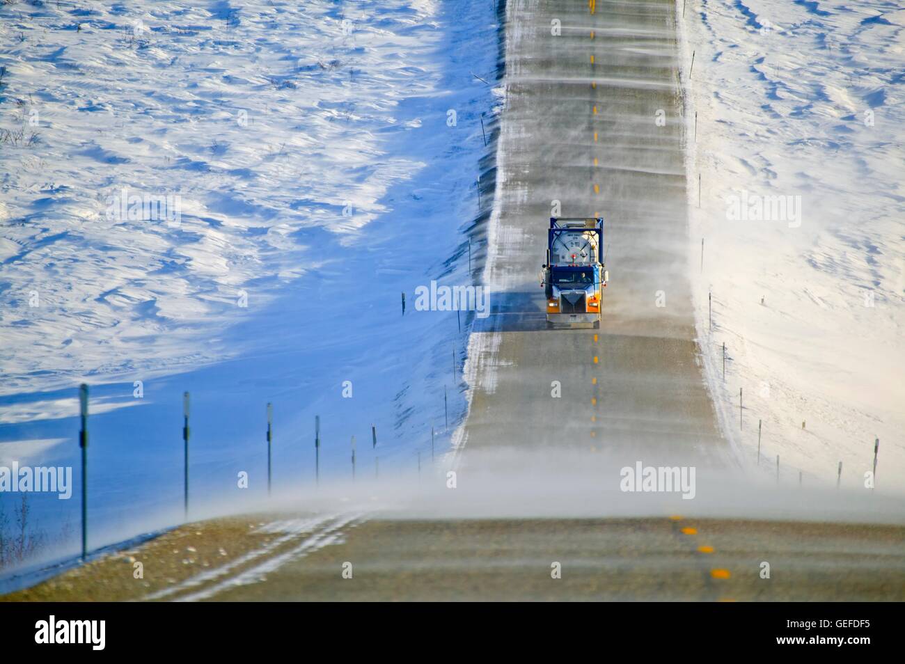 geography / travel, USA, Alaska, Truck north of the arctic circle in Alaska on the James Dalton Highway (aka Haul Road) in winter on a stormy day. Stock Photo