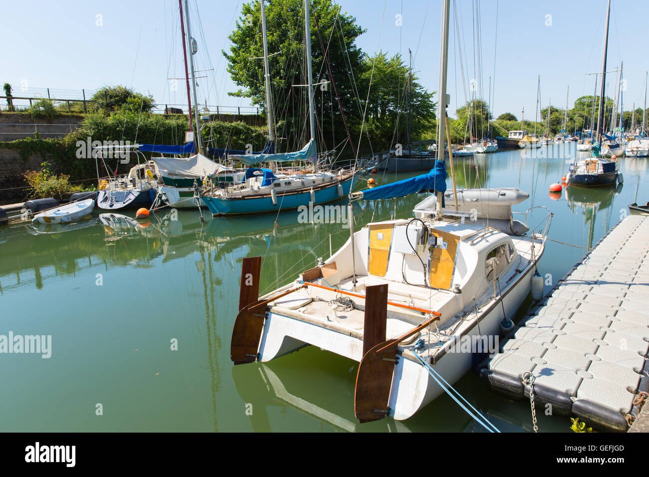 Boats in Lydney harbour Gloucestershire England uk on the River Severn Stock Photo