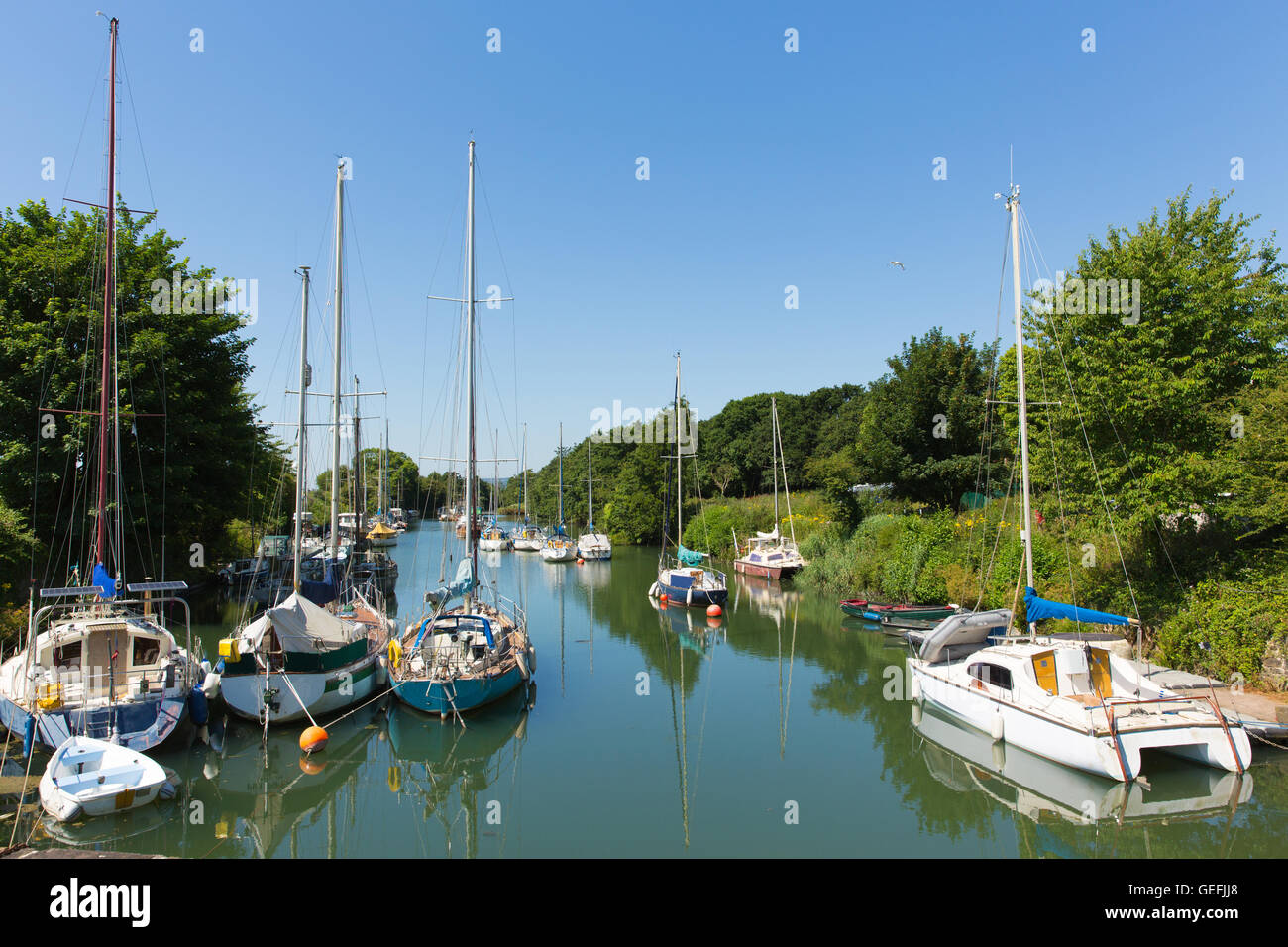 Lydney harbour Gloucestershire England uk with boats on sunny day Stock Photo