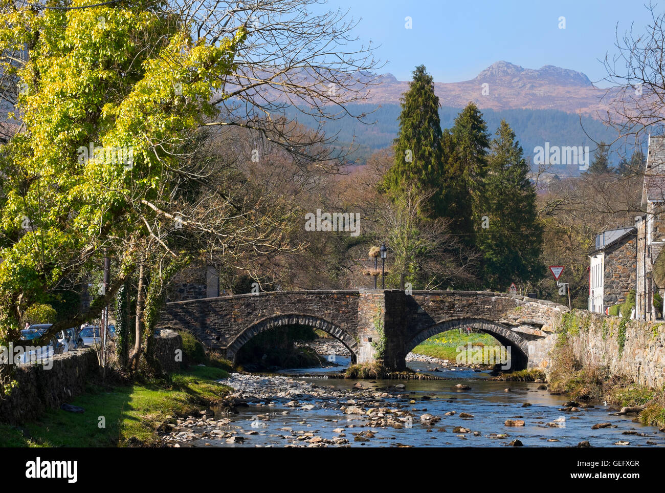 Bridge over the rivers Glaslyn and Colwyn at Beddgelert, Snowdonia, Wales, UK Stock Photo