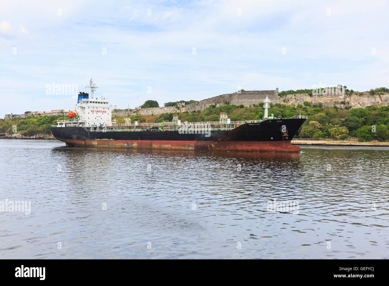 Cargo freight ship coming into the port of Havana, Cuba Stock Photo