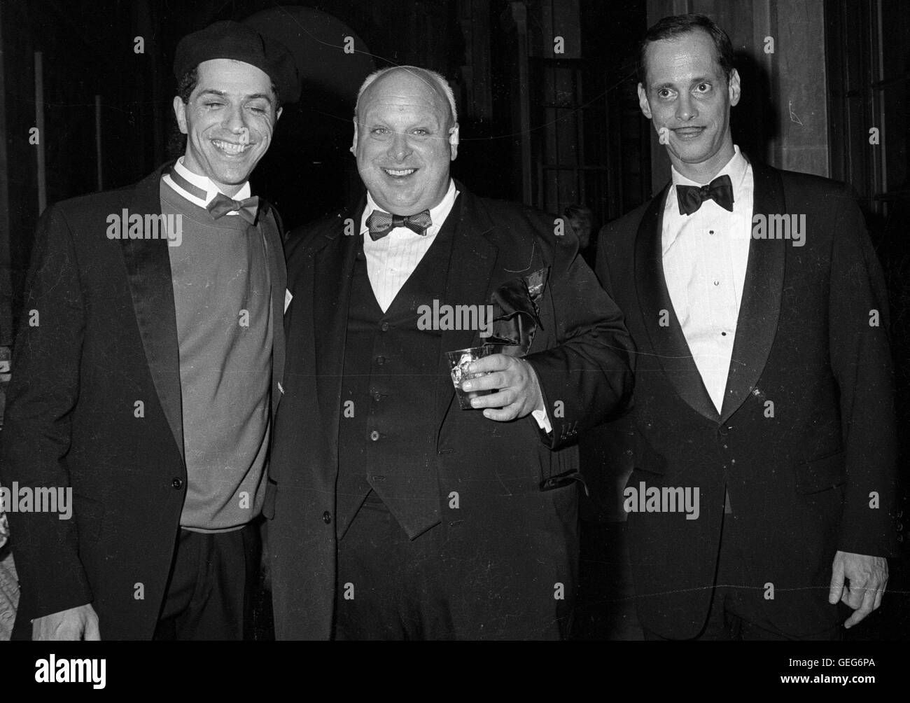 Baltimore, MD February 16, 1988  Divine (Harris Glen Milstead) in the middle with director, John Waters (right) and an unknown friend at the premiere of the orginial movie, 'Hairspray'  Divine died six weeks after the premiere.  Credit: Patsy Lynch/MediaP Stock Photo