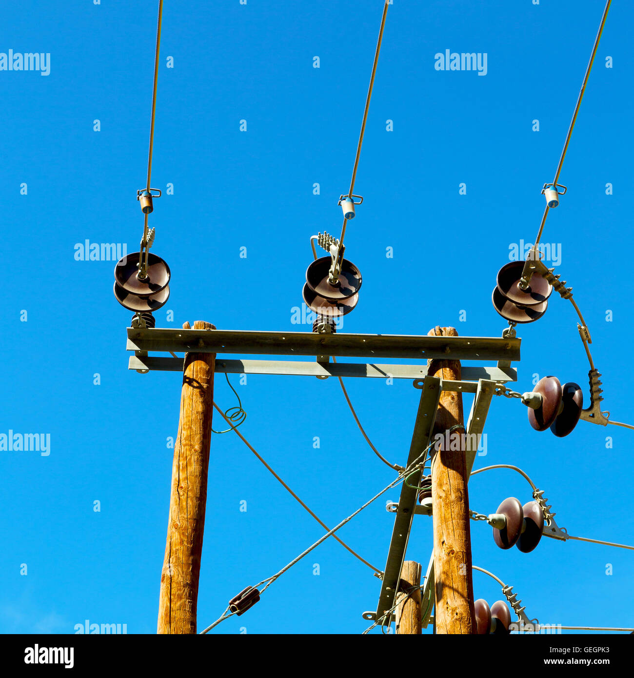 wood pylon energy and current line in oman the electric cable Stock