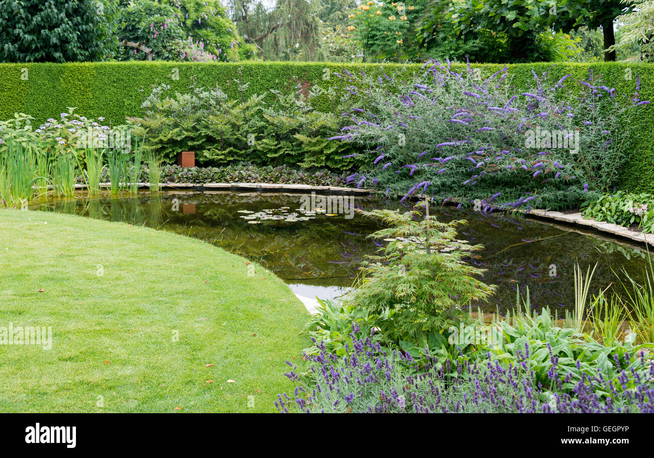 Appeltern, The Netherlands, July 23, 2016: English garden with flowers and water on 23 july 2016 in Appeltern,The Gardens of App Stock Photo