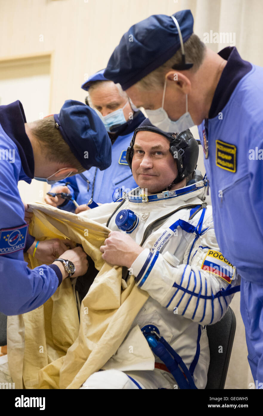 Cosmonauts Alexey Ovchinin and Andrey Shelepin suit up at Baikonur Cosmodrome in preparation for Expedition 47, part of their journey to the International Space Station. Stock Photo