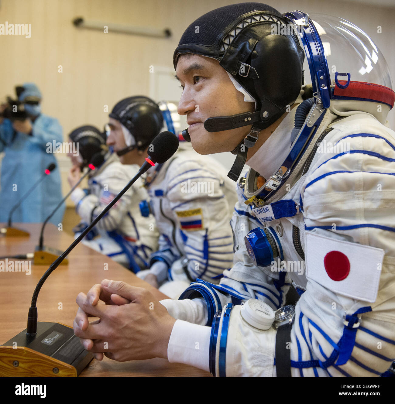 The Expedition 48 crew members, including Andrey Shelepin, Takuya Onishi, and Anatoly Ivanishin, prepare for their mission during preflight activities at Baikonur Cosmodrome. Stock Photo
