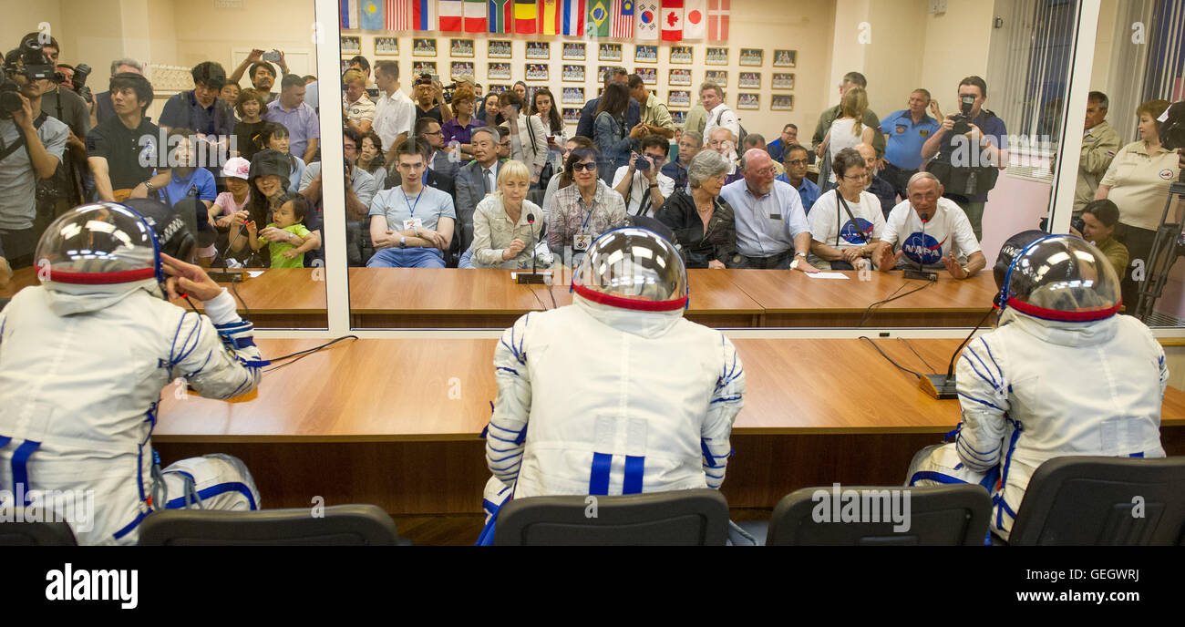 Expedition 48 crew members, including Kate Rubins, Anatoly Ivanishin, and Andrey Shelepin, prepare for launch in their Russian Sokol suits at Baikonur Cosmodrome, Kazakhstan. Stock Photo