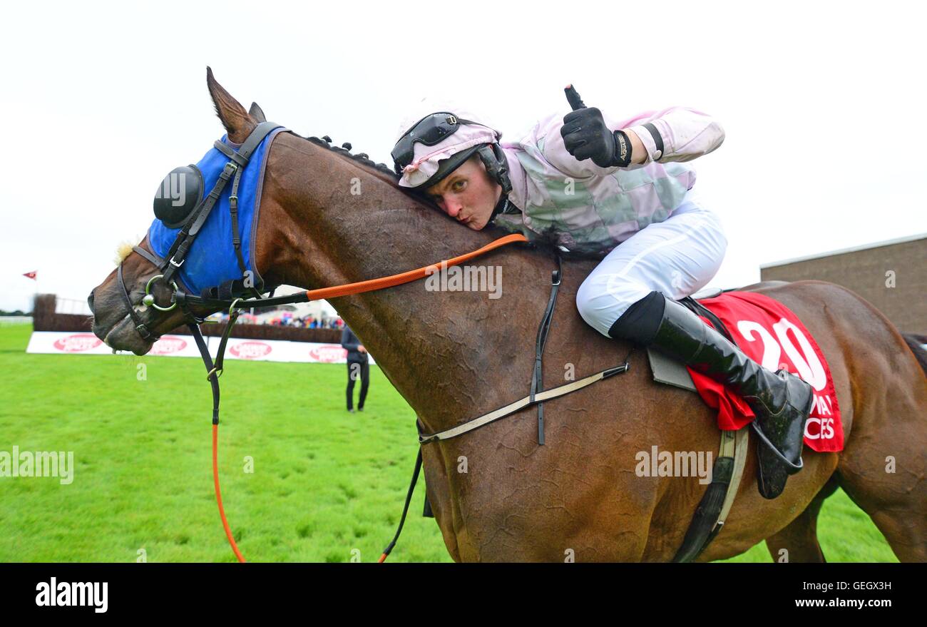 Barry Browne celebrates winning the Connacht Hotel (Q.R.) Handicap on Swamp Fox during day one of the Galway Festival in Ballybrit, Republic of Ireland. Stock Photo