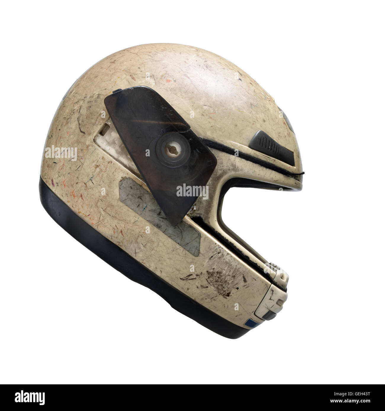Damaged motorcycle helmet against white background. Clipping path Stock Photo