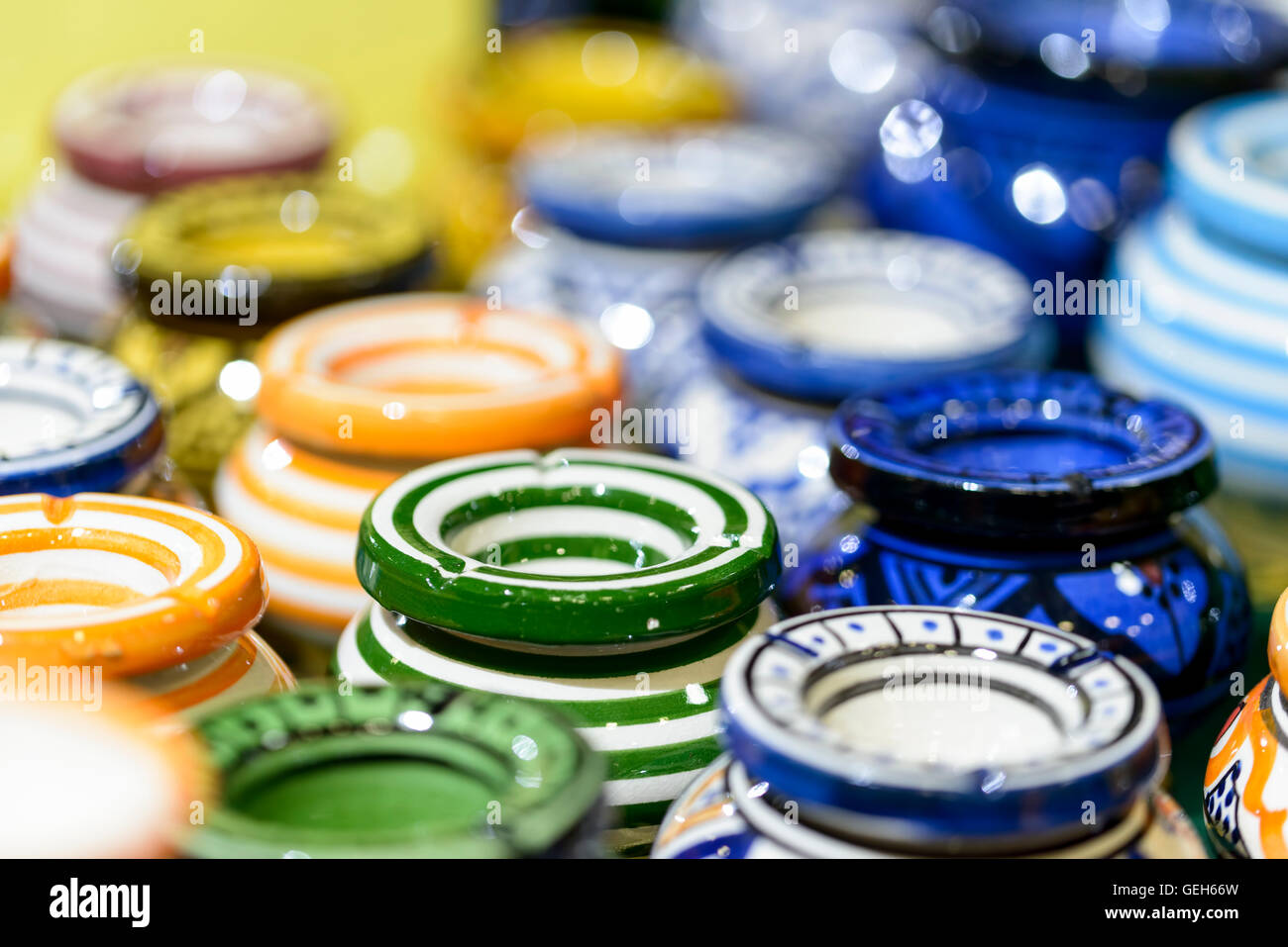 colored ceramic ashtrays for sale in a bazaar Stock Photo Alamy