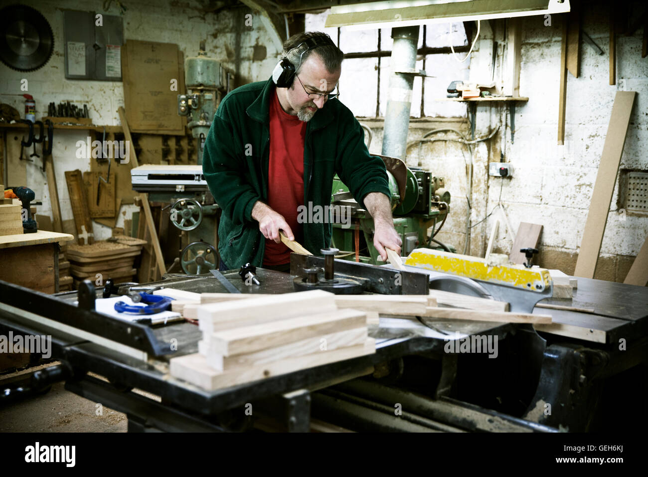 A man working in a furniture maker's Stock Photo Alamy
