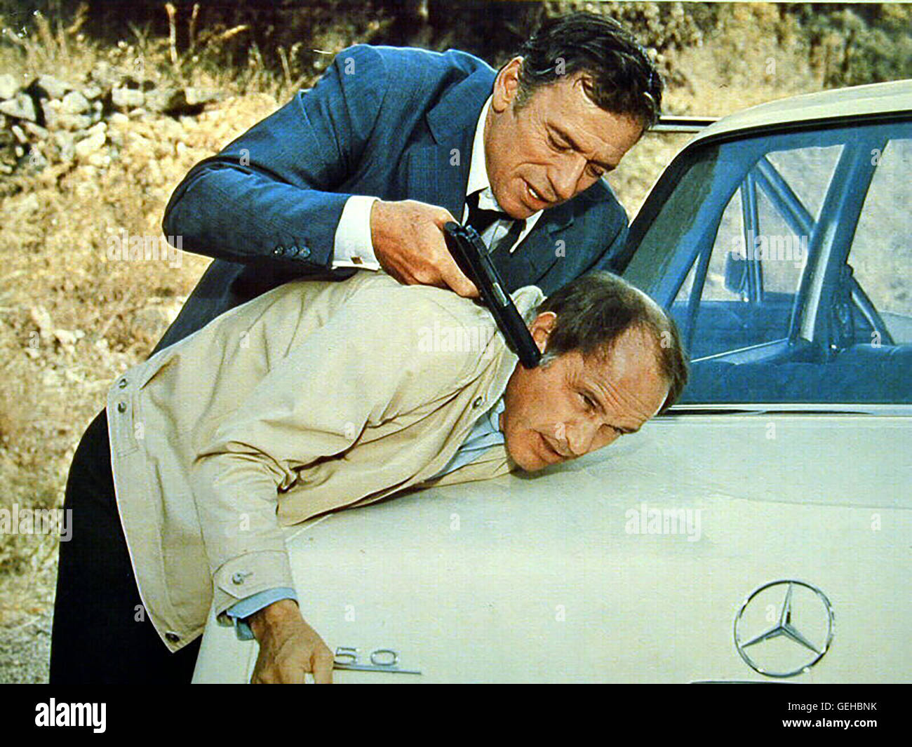 Yves Montand, Marcel Bozzuffi  *** Local Caption *** 1972, 1970er, 1970s, Film, Fils, Le, Revolver, Le Fils Stock Photo