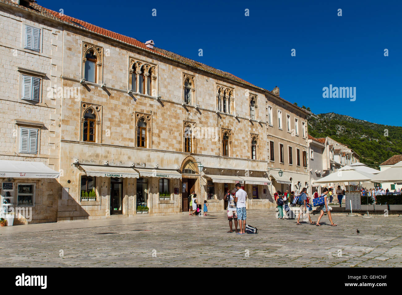 STARI GRAD, CROATIA - JULY 1, 2014: Unidentified people in Stari Grad on Hvar island, Croatia. Stari Grad (Pharos) is the oldest Stock Photo
