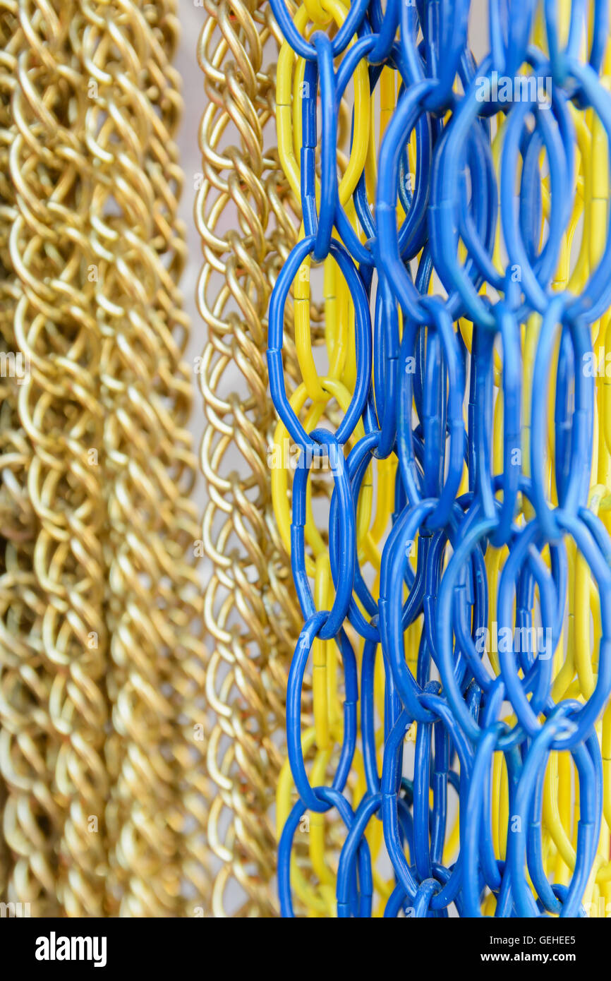 Bright colored wires chains decorative background Stock Photo - Alamy