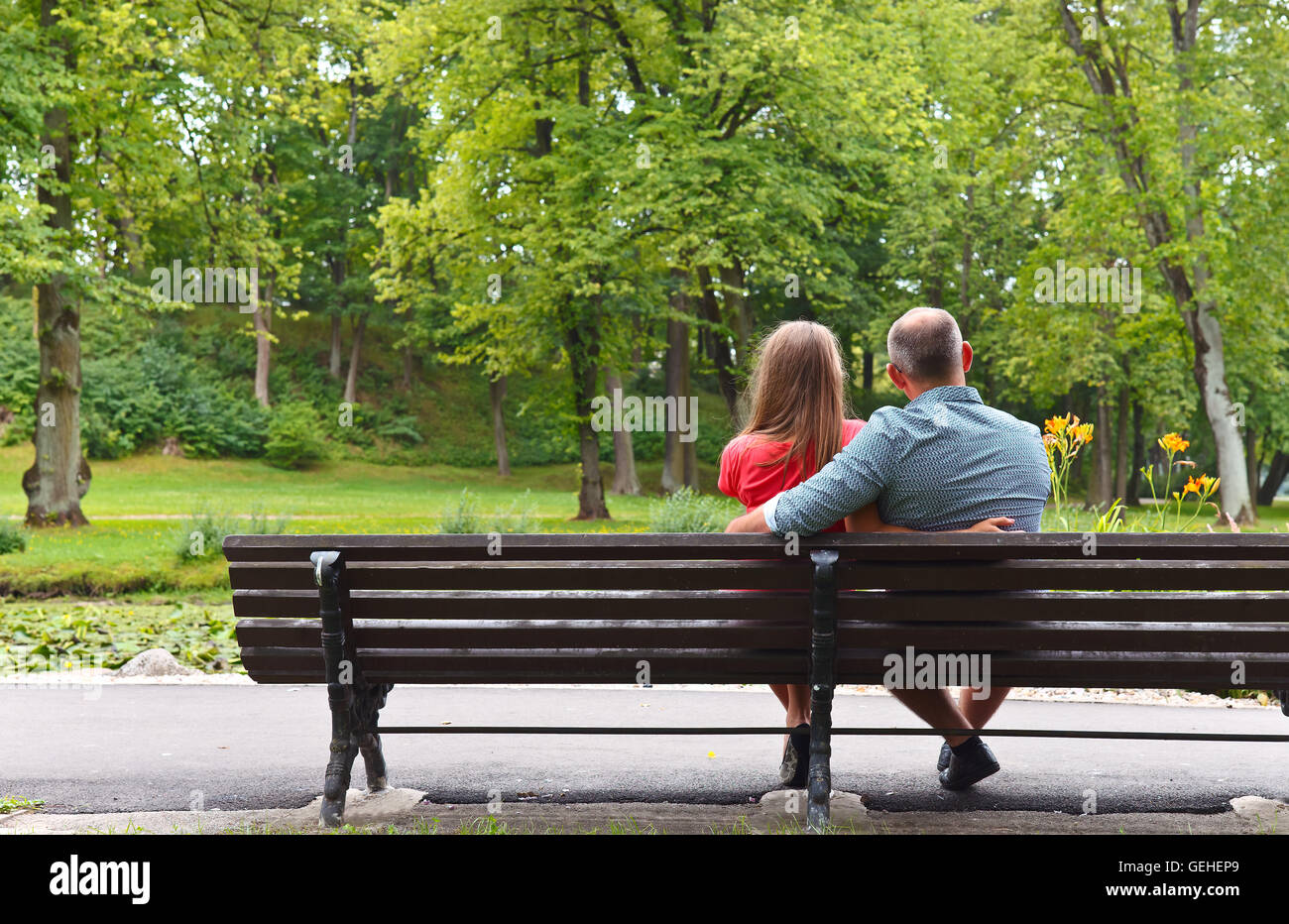 pregnant woman walking with her husband in park Stock Photo - Alamy
