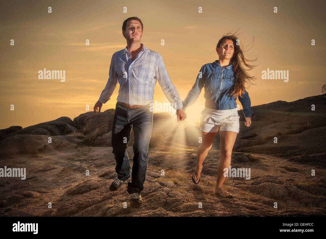 photo Couple Running Together Holding Hands https www alamy com stock photo couple running away holding hands at sunset 112252684 html