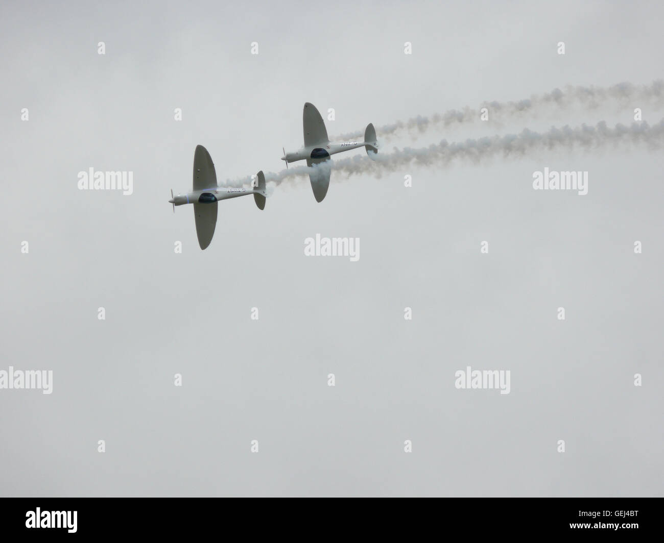 2 planes flying with smoke Stock Photo