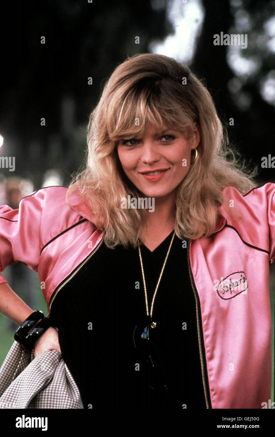 MICHELLE PFEIFFER, 1982 Stephanie Zinone (Michelle Pfeiffer) steht aber nur auf knallharte Motorrad-Biker. Ploetzlich taucht ein geheimnisvoller Motorrad-Held auf und verdreht ihr ordentlich den Kopf. *** Local Caption *** 1982, Grease 2, Grease 2 Stock Photo