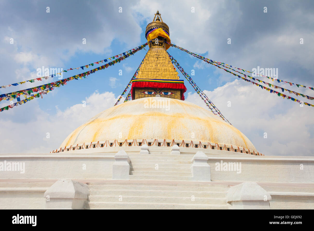 Photo of Boudhanath Stupa in the Kathmandu valley with clouds the sky Nepal. Horizontal. Stock Photo