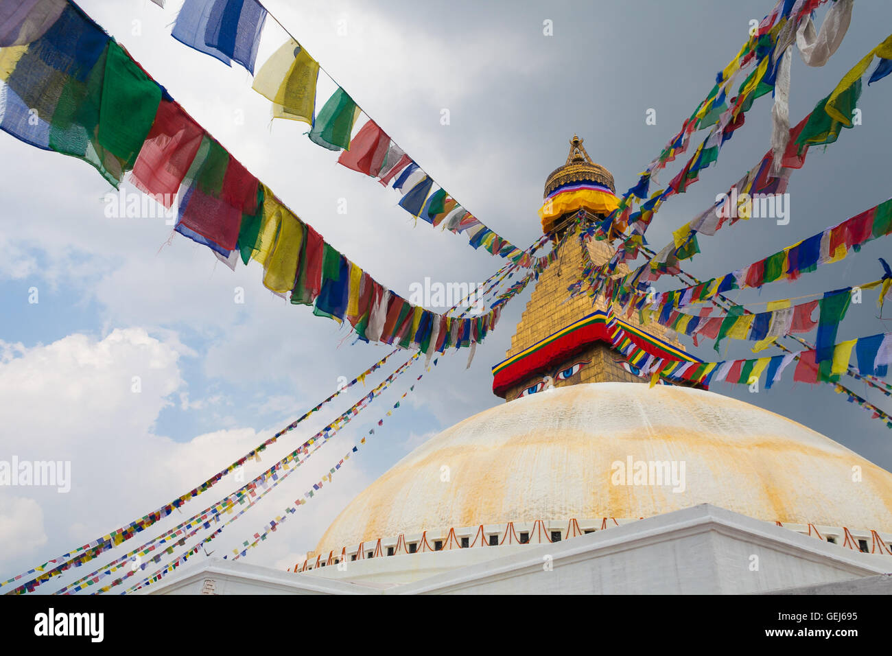 Picture of Boudhanath Stupa in the Kathmandu valley with clouds the sky Nepal. Horizontal photo. Stock Photo