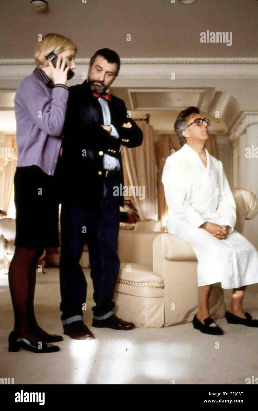 Anne Heche, Robert De Niro, Dustin Hoffman Gemeinsam mit Winifred Ames (Anne Heche), einer Mitarbeiterin des Praesidenten, entwerfen Conrad Brean (Robert De Niro,m) und Motss (Dustin Hoffman) ein spektakulaeres Ablenkungsmanoever. *** Local Caption *** Stock Photo