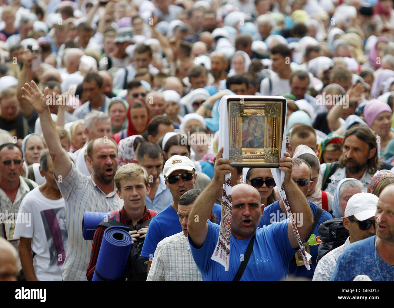 Kiev, Ukraine. 27th July, 2016. Ukrainian believers of the Ukrainian Orthodox Church of the Moscow Patriarchate attend a many-thousand cross procession marking the 1028th anniversary of the Christianization of the Kievan Rus, in Kiev, Ukraine, on 27 July, 2016 Credit:  Serg Glovny/ZUMA Wire/Alamy Live News Stock Photo