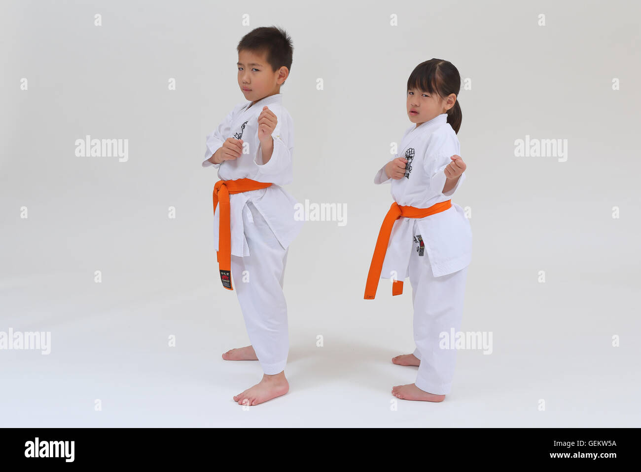 Japanese kids in karate uniform on white background Stock Photo Alamy