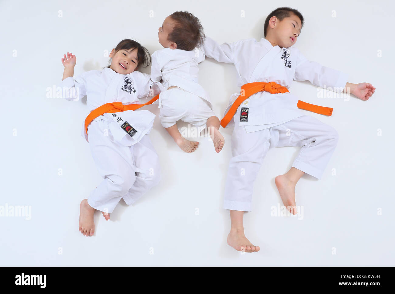 Japanese kids in karate uniform on white background Stock Photo Alamy