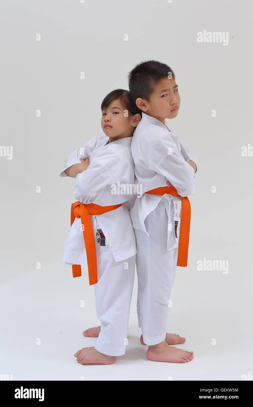 Japanese kids in karate uniform on white background Stock Photo Alamy
