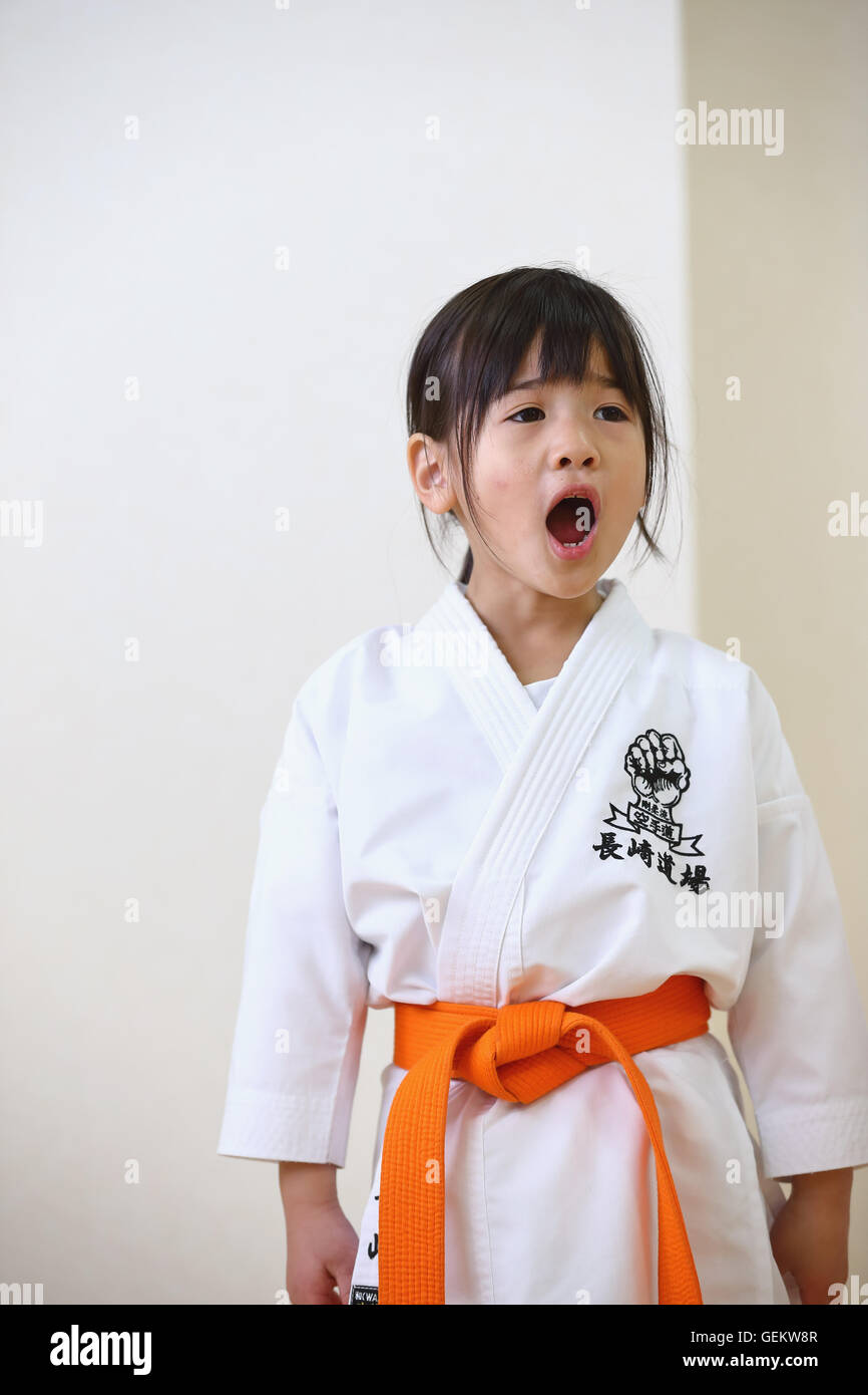 Japanese kid in karate uniform training Stock Photo Alamy