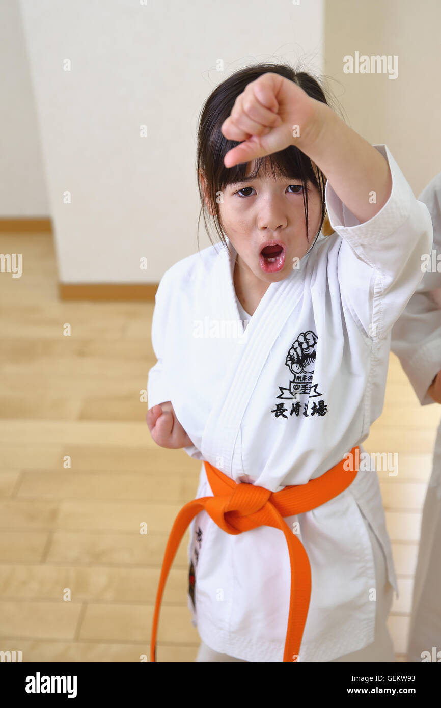Japanese kid in karate uniform training Stock Photo Alamy