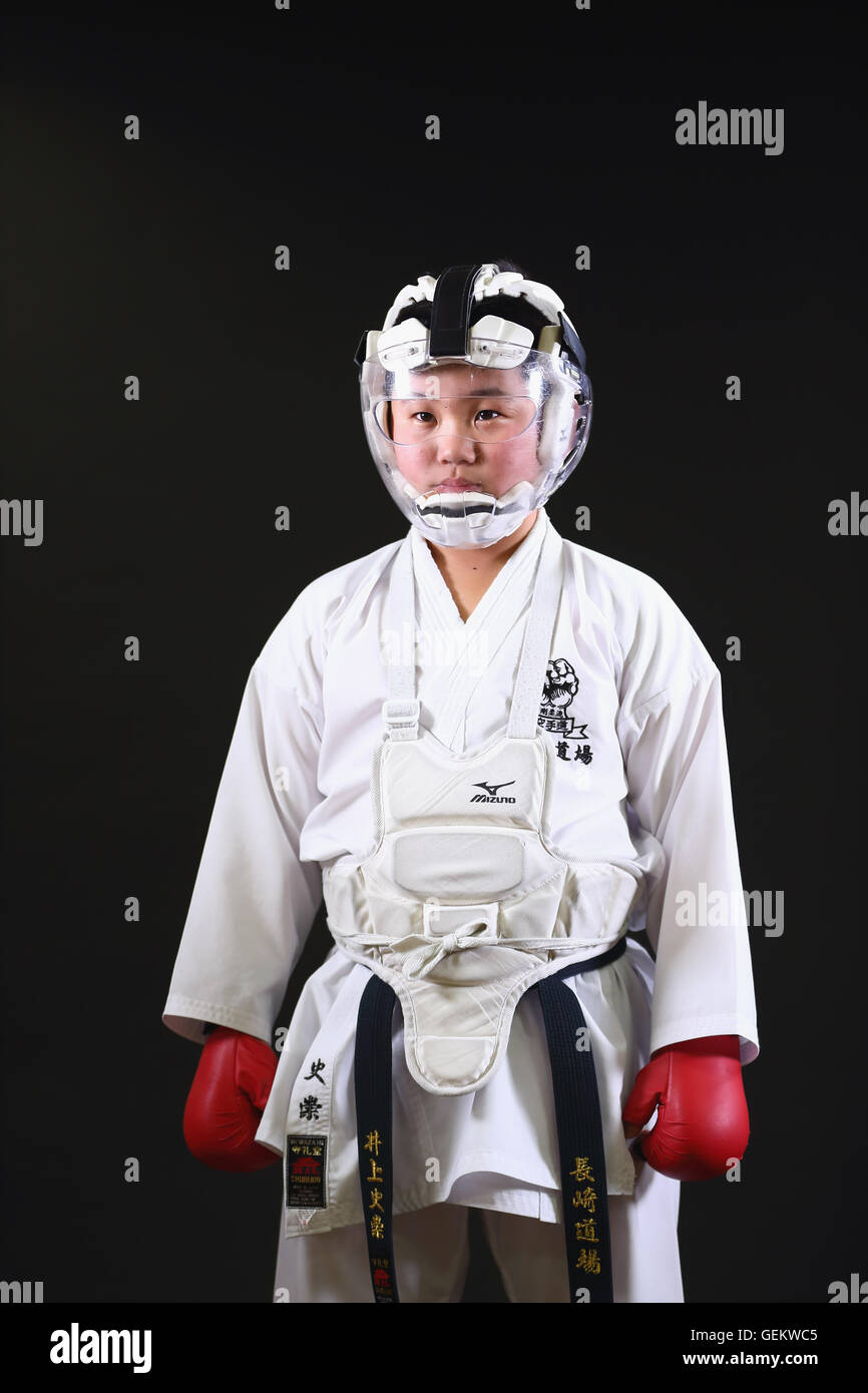 Japanese kid in karate uniform on black background Stock Photo Alamy