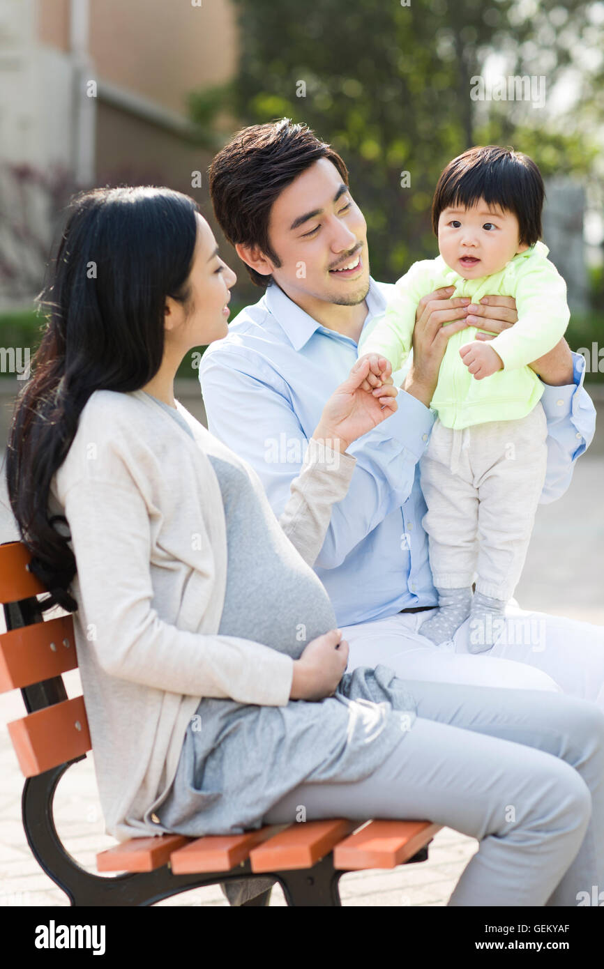 Happy young Chinese family Stock Photo - Alamy