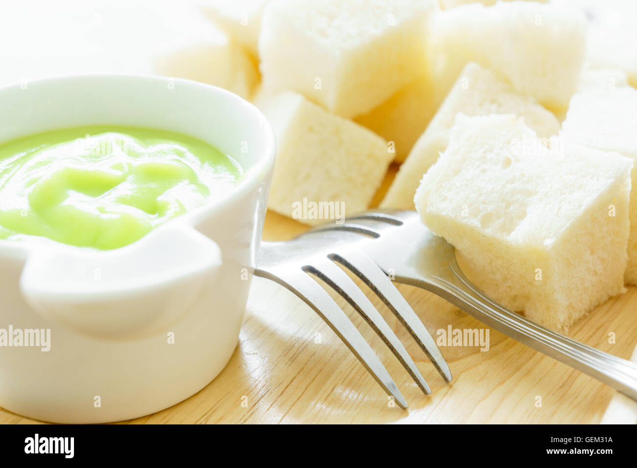 Steamed bread with pandan custard cream sauce Stock Photo