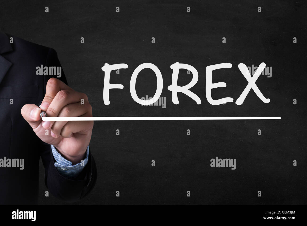 FOREX and Businessman drawing  Page on blackboard Stock Photo