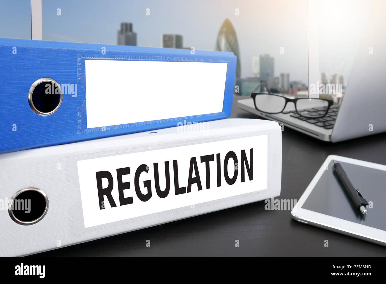 REGULATION Office folder on Desktop on table with Office Supplies Stock Photo Alamy