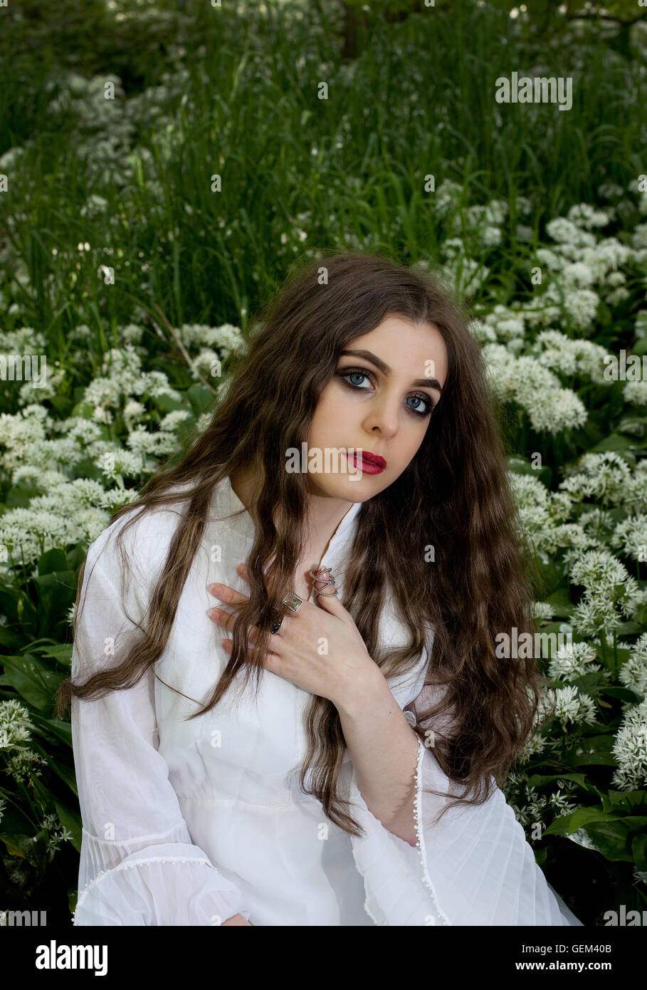 Woman wearing silver dress hi-res stock photography and images - Alamy
