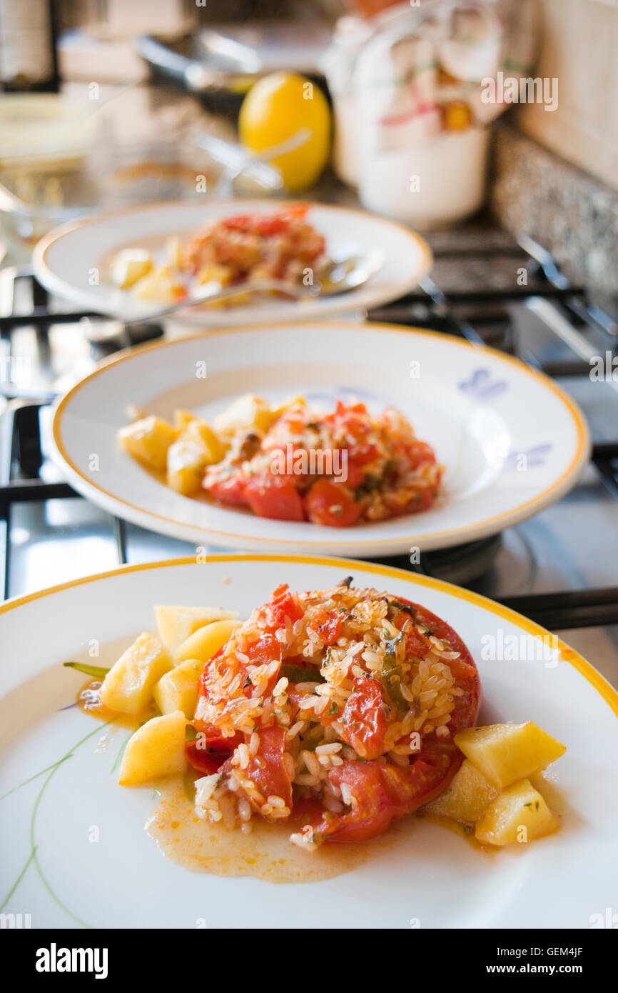 dishes of stuffed tomatoes with rice Stock Photo