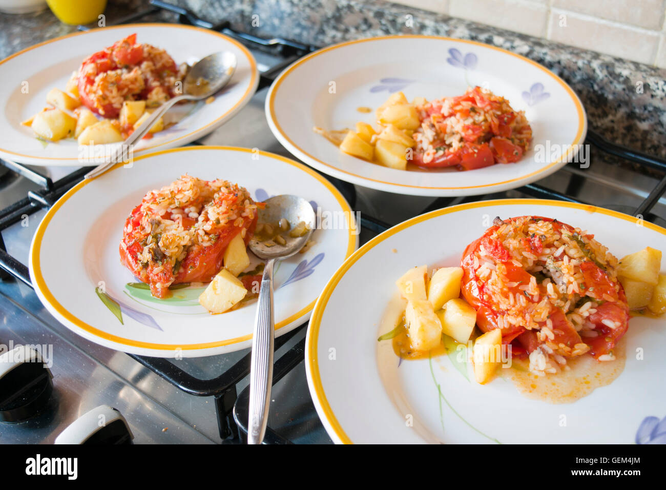 dishes of stuffed tomatoes with rice Stock Photo