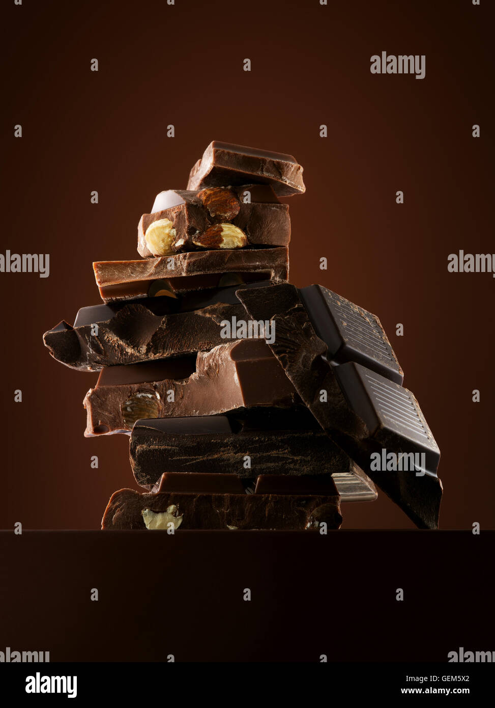 Close up view of chocolate bars on brown background Stock Photo - Alamy