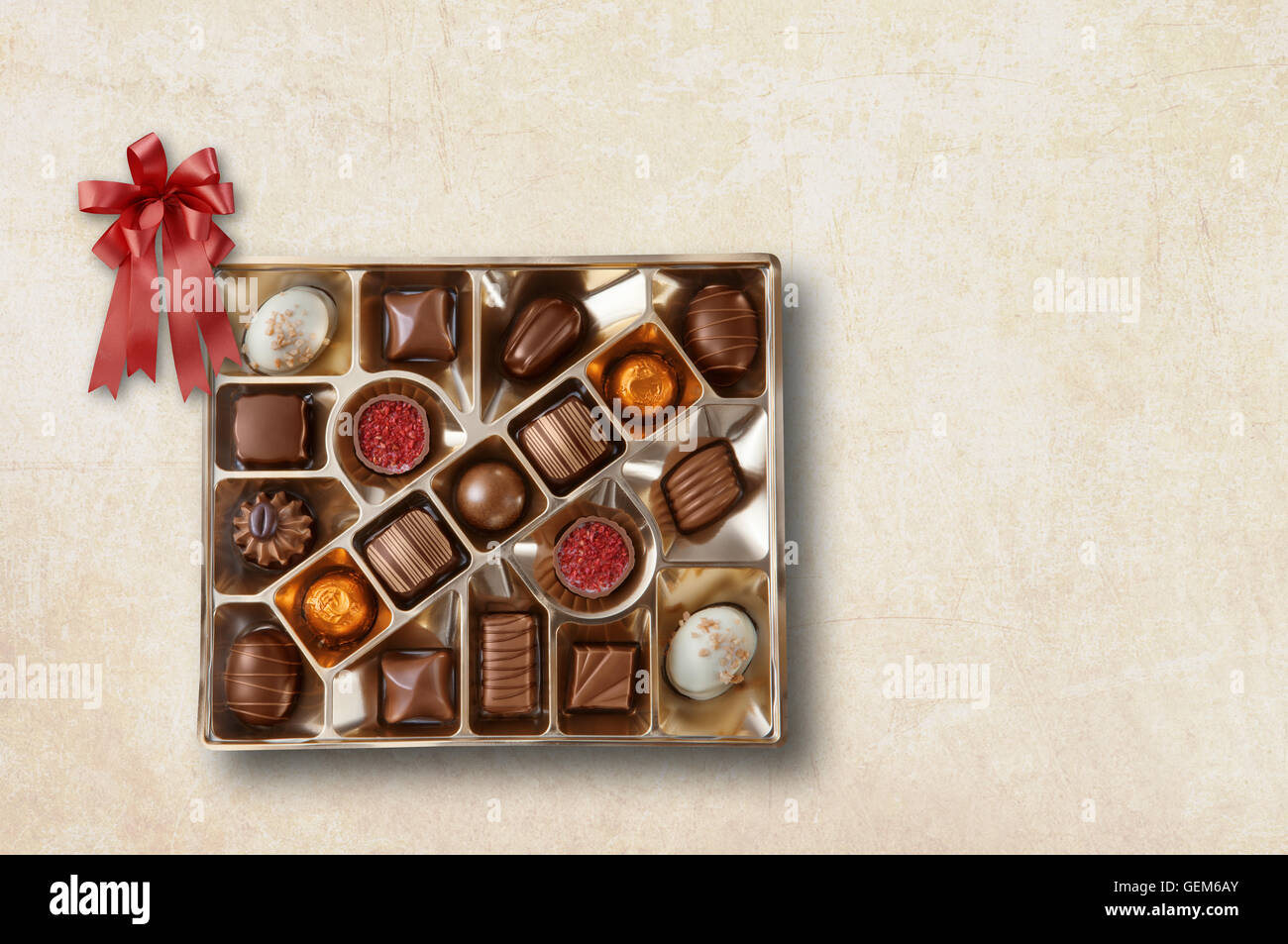 Close up view of chocolate candy on color background Stock Photo - Alamy