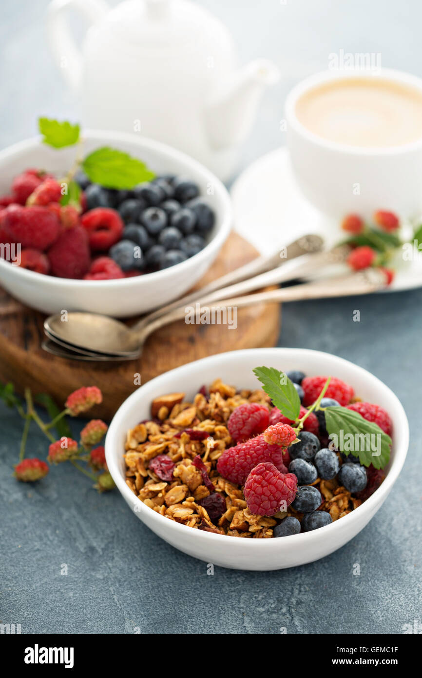 Granola and berries with coffee Stock Photo
