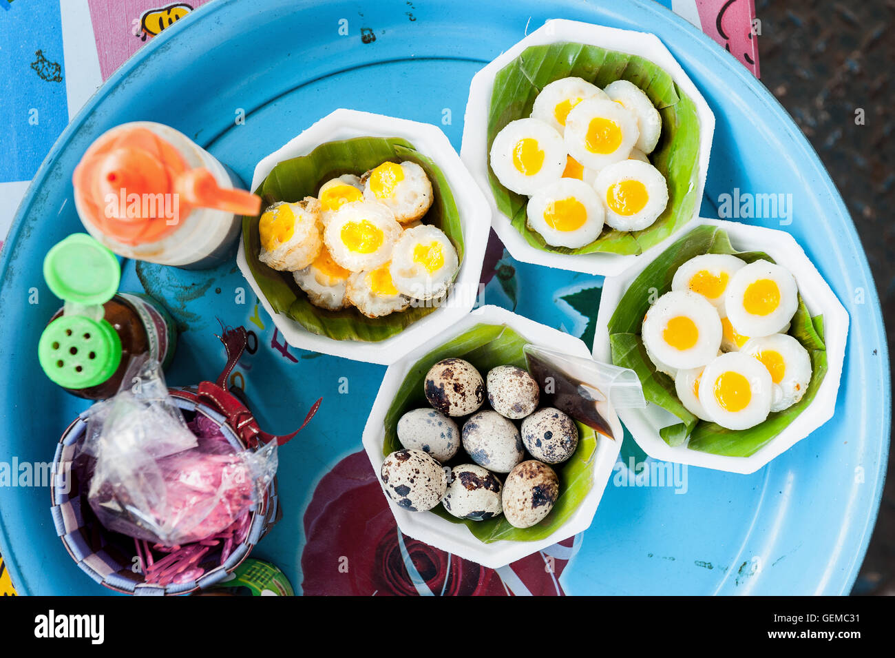 fried quail eggs in tray Stock Photo Alamy
