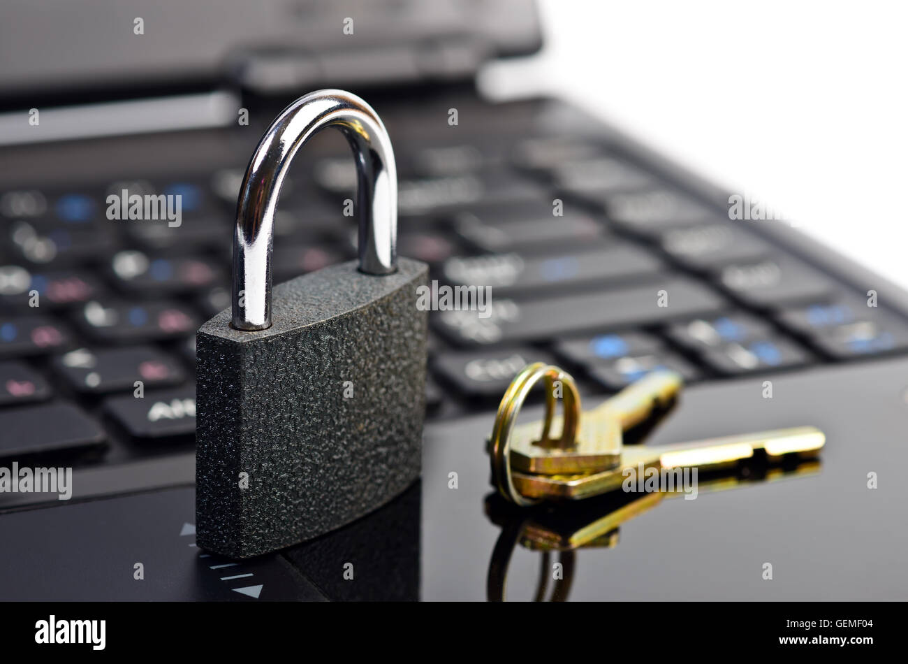 Data security concept with padlock on laptop computer keyboard Stock Photo